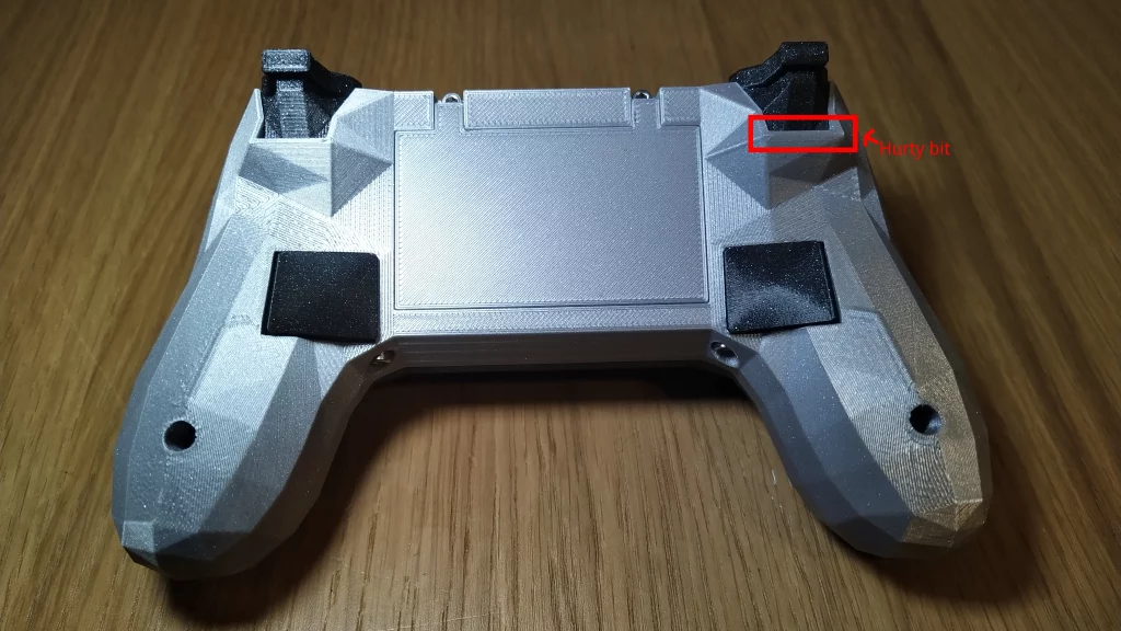 Picture of the underside of the Alpakka controller with a red box highlighting sharp edge.